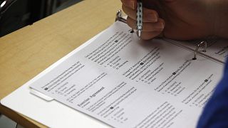 Image: A student takes a college preparation test at Holton Arms School in 