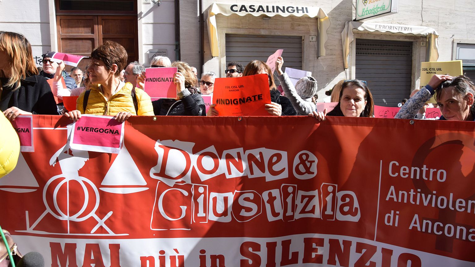 Image: A demonstration outside Ancona's court after it emerged that two men