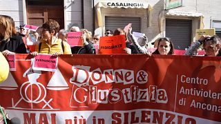 Image: A demonstration outside Ancona's court after it emerged that two men