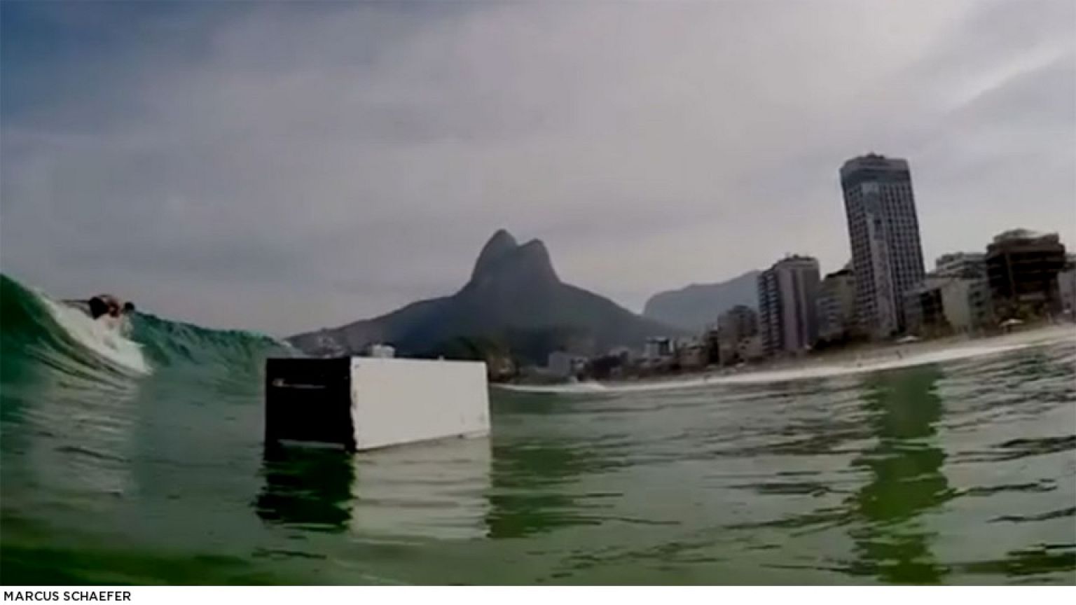 Surfer's close encounter with a fridge prompts pollution plea