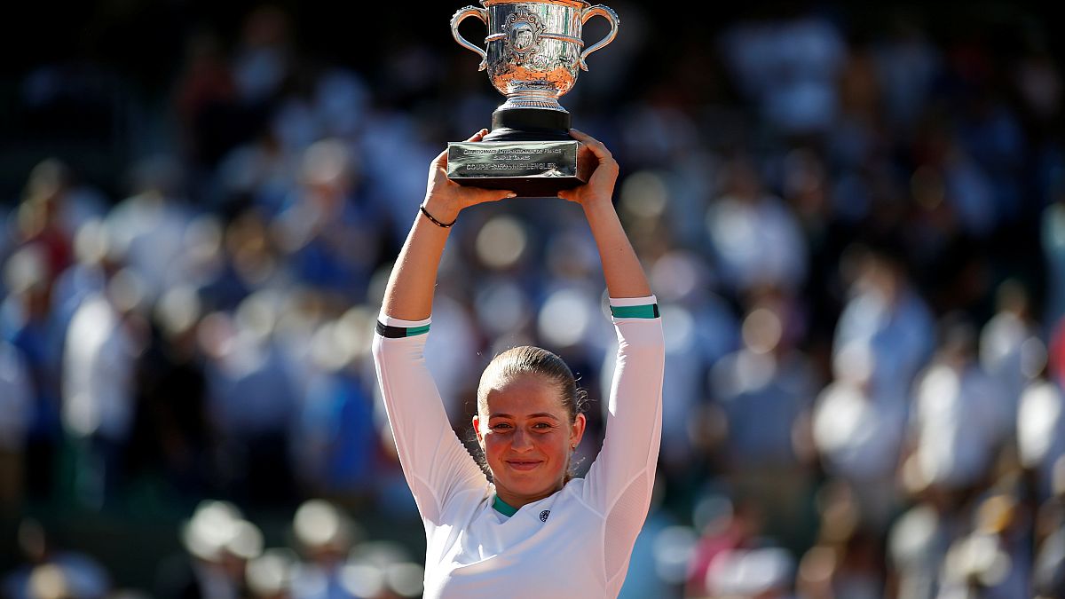 Unseeded Ostapenko wins historic French Open title