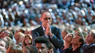 Fred Guttenberg watches a monitor honoring the 17 students and teachers who