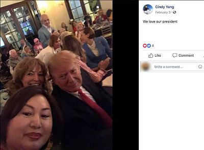 First reported by the Miami Herald, a photo on the Facebook page of Li Yang showed her posing with President Donald Trump at a Super Bowl watch party at the president\'s West Palm Beach country club.