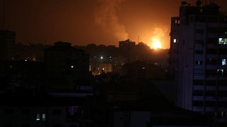 Image: Smoke and flame are seen during an Israeli air strike in Gaza
