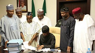 Nigeria's acting president signs record $23 bn 2017 budget into law