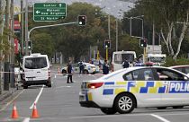 Image: Police stand outside a mosque in Linwood, Christchurch, New Zealand,