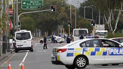 Image: Police stand outside a mosque in Linwood, Christchurch, New Zealand,
