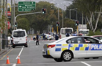 Police block the road near the shooting at a mosque in Linwood, Christchurch, New Zealand, Friday, March 15, 2019.