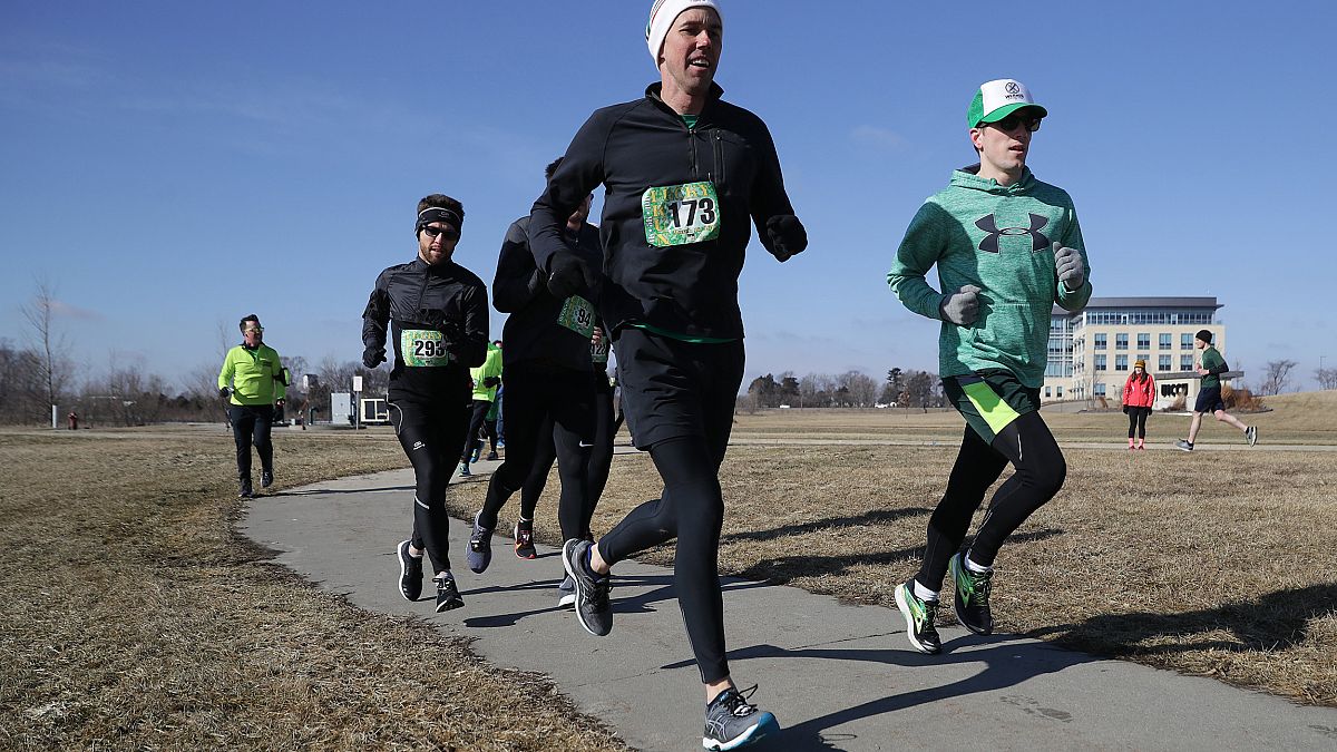 Image: Beto O'Rourke participates in the Lucky Run 5k Race in North Liberty