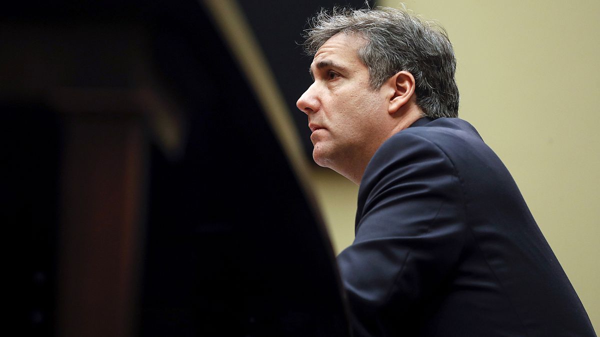 Image: Michael Cohen, former lawyer to President Donald Trump, testifies be