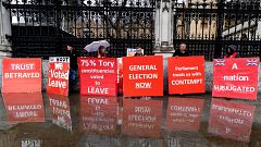 Image: Pro-Brexit activists hold placards as they demonstrate outside the H