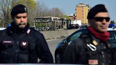Image: Italian Carabinieri policemen stand by by the wreckage of a school b