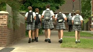 Skirting the issue: schoolboys attend class in skirts during heatwave