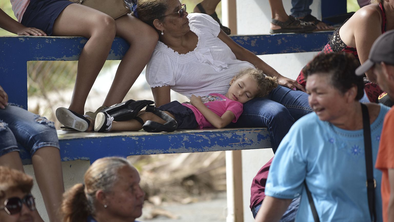 Image: People Queue to File FEMA Forms