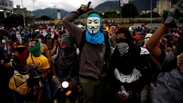 Clashes in Caracas as Venezuela opposition rally over activist's death