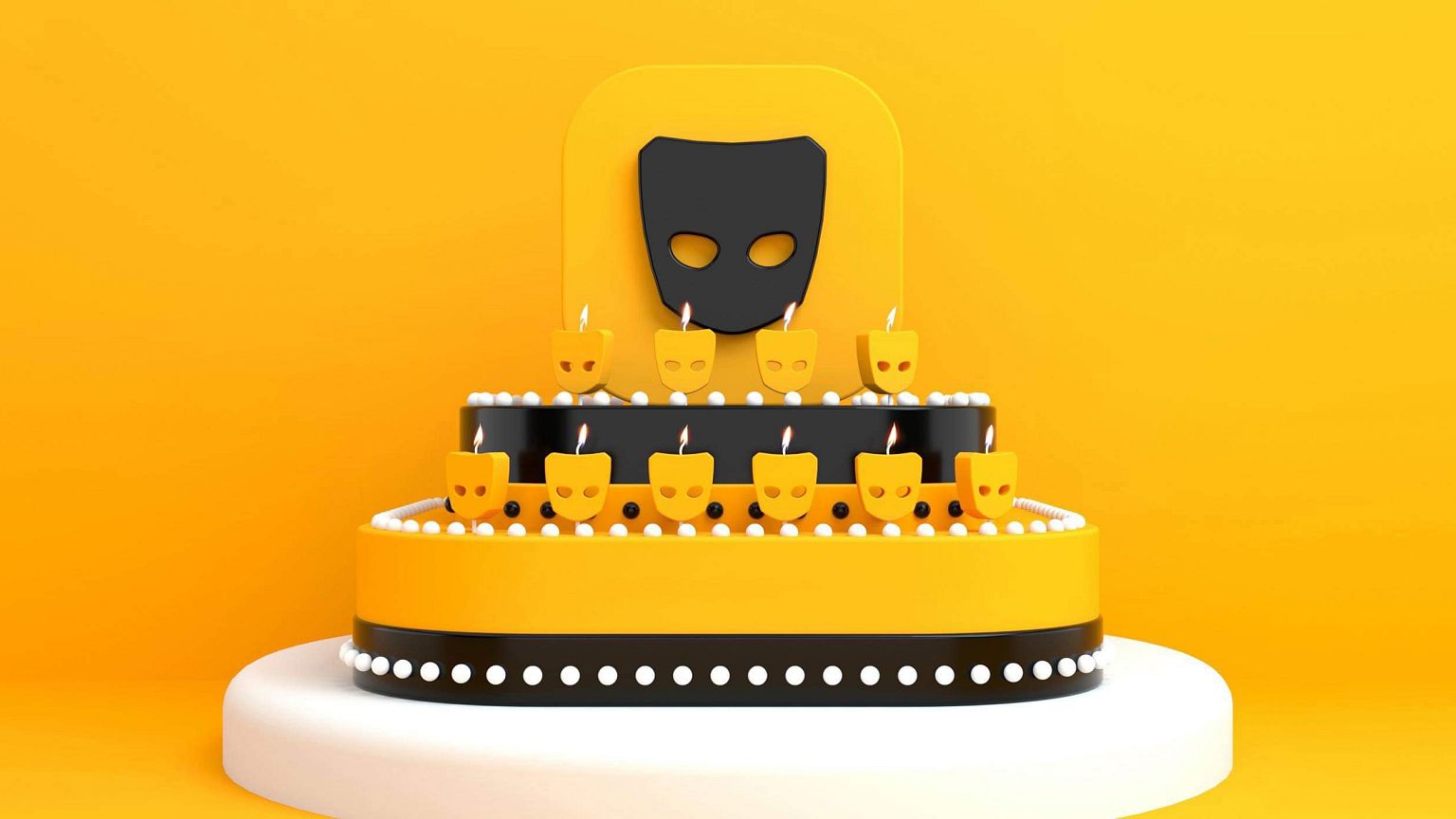 Illustration of a cake with Grindr logo candles burning.