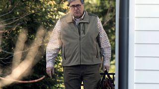 Image: Attorney General William Barr leaves his home in McLean, Virginia, o