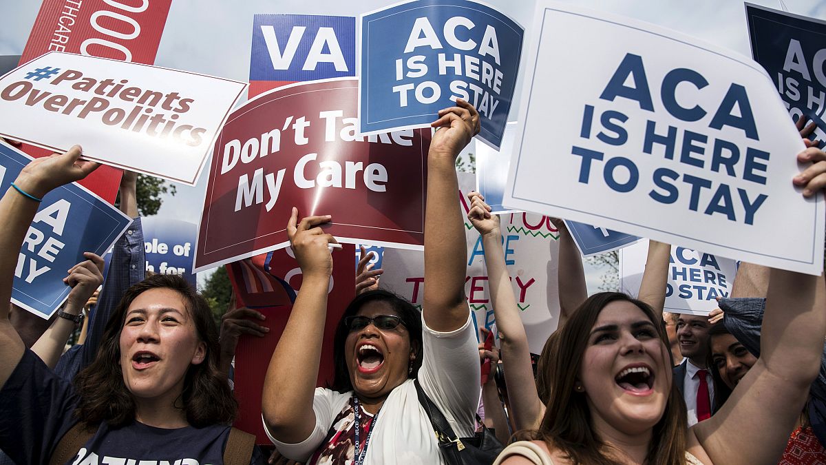 Image: Supporters of the Affordable Care Act celebrate after a Supreme Cour