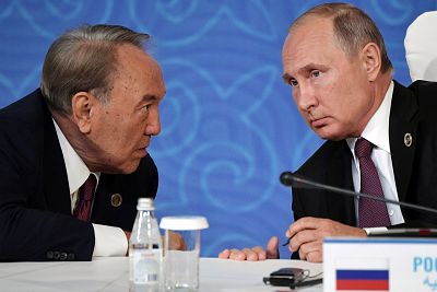 Kazakhtan\'s President Nursultan Nazarbayev, left, and Russian President Vladimir Putin chat at a recent regional Summit.