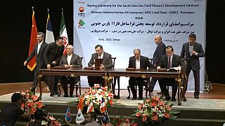 Total re-invests in Iran