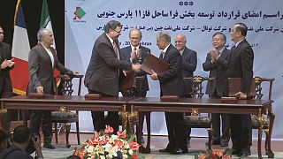 Iran and French oil giant Total clinch energy deal