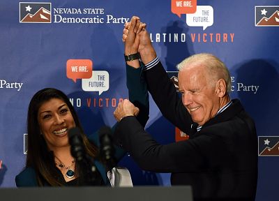 Democratic candidate for lieutenant governor and current Nevada Assemblywoman Lucy Flores, D-Las Vegas, from left, introduces Vice President Joe Biden at a get-out-the-vote rally at a union hall in Las Vegas, Nevada on Nov. 1, 2014.