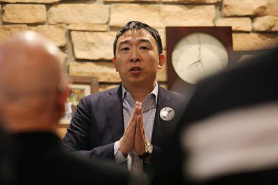 Andrew Yang speaks at a local democratic activist event in Iowa City, Iowa, on March 10, 2019.