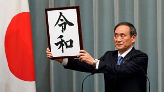 Image: Japan's Chief Cabinet Secretary Yoshihide Suga unveils 'Reiwa' as th