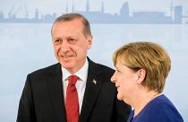 Merkel meets Erdogan, Trump ahead of tense G20 summit