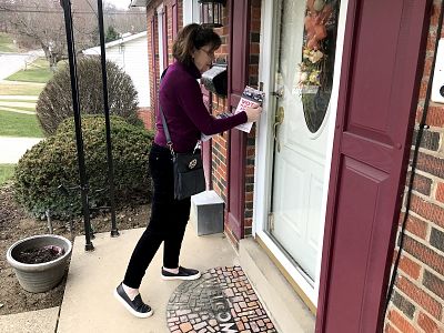 Democrat Pam Iovino knocks on doors of potential voters in Bethel Park, Pennsylvania on March 30, 2019.