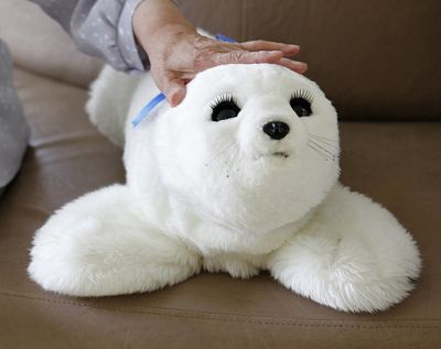 PARO is therapeutic robot that looks like a small, white seal. 
