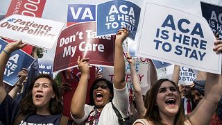 Image:  Supporters of the Affordable Care Act celebrate after the Supreme C