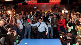 Image: Volodymyr Zelenskiy plays table tennis at his campaign headquarters