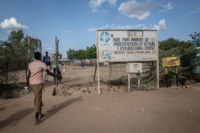 A sign and comment box tells refugees to report sexual exploitation and abuse in the Kakuma refugee camp.