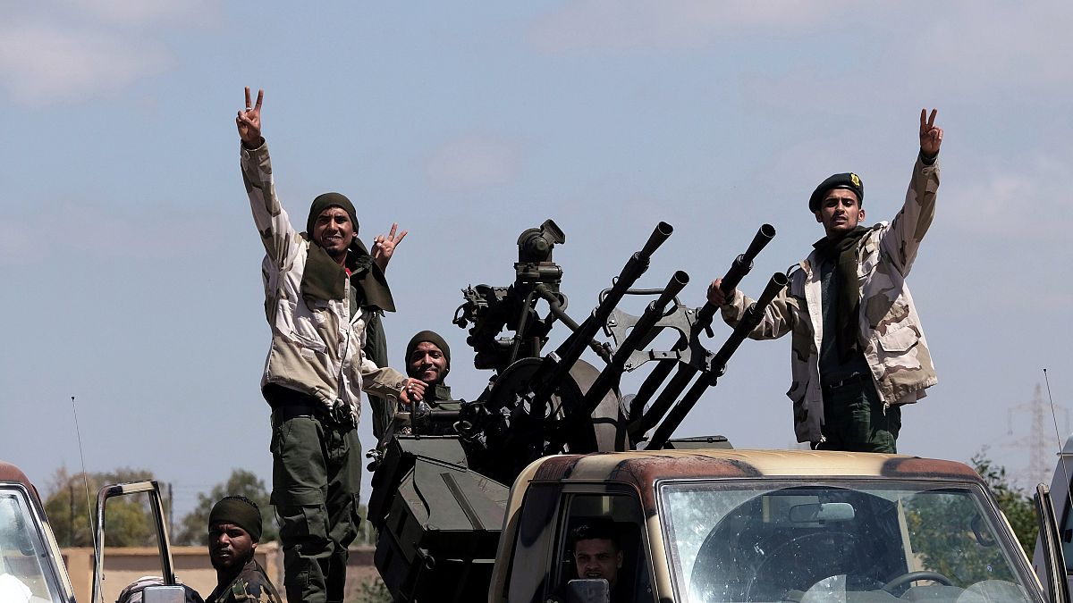 Image: Members of the self-styled Libyan National Army leave Benghazi