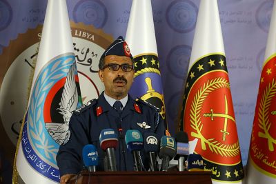Col. Mohamed Gnounou, a spokesman for the Libyan forces of the National Reconciliation Government, holds a press conference in Tripoli on Sunday.