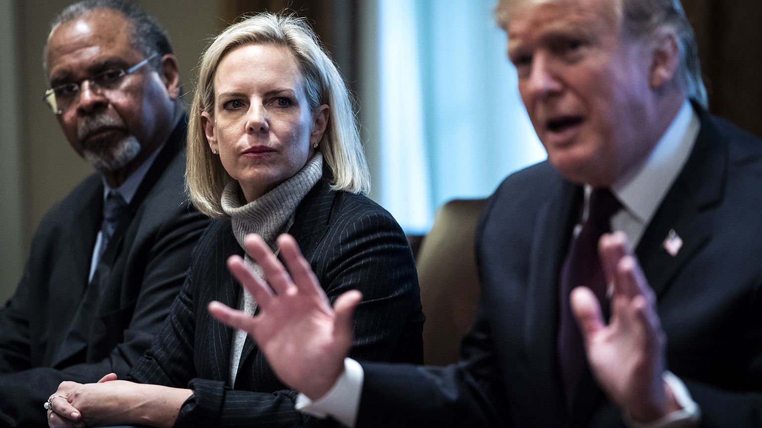 Image: President Donald Trump, flanked by Secretary of Homeland Security Ki