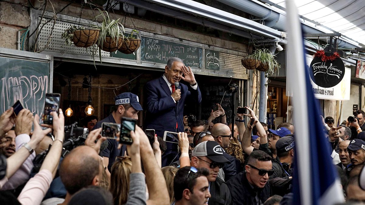 Image: Israeli Prime Minister Benjamin Netanyahu speaks to supporters at th