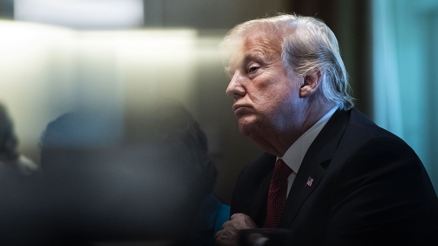 Image: President Donald Trump listens during a cabinet meeting in the White