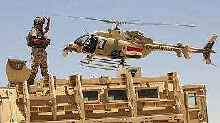 تیراندازی هلیکوپتر عراقی به افراد داعش در ساحل دجله