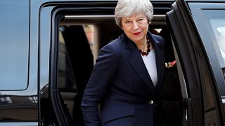 Image: British Prime Minister Theresa May leaves after a meeting with Frenc