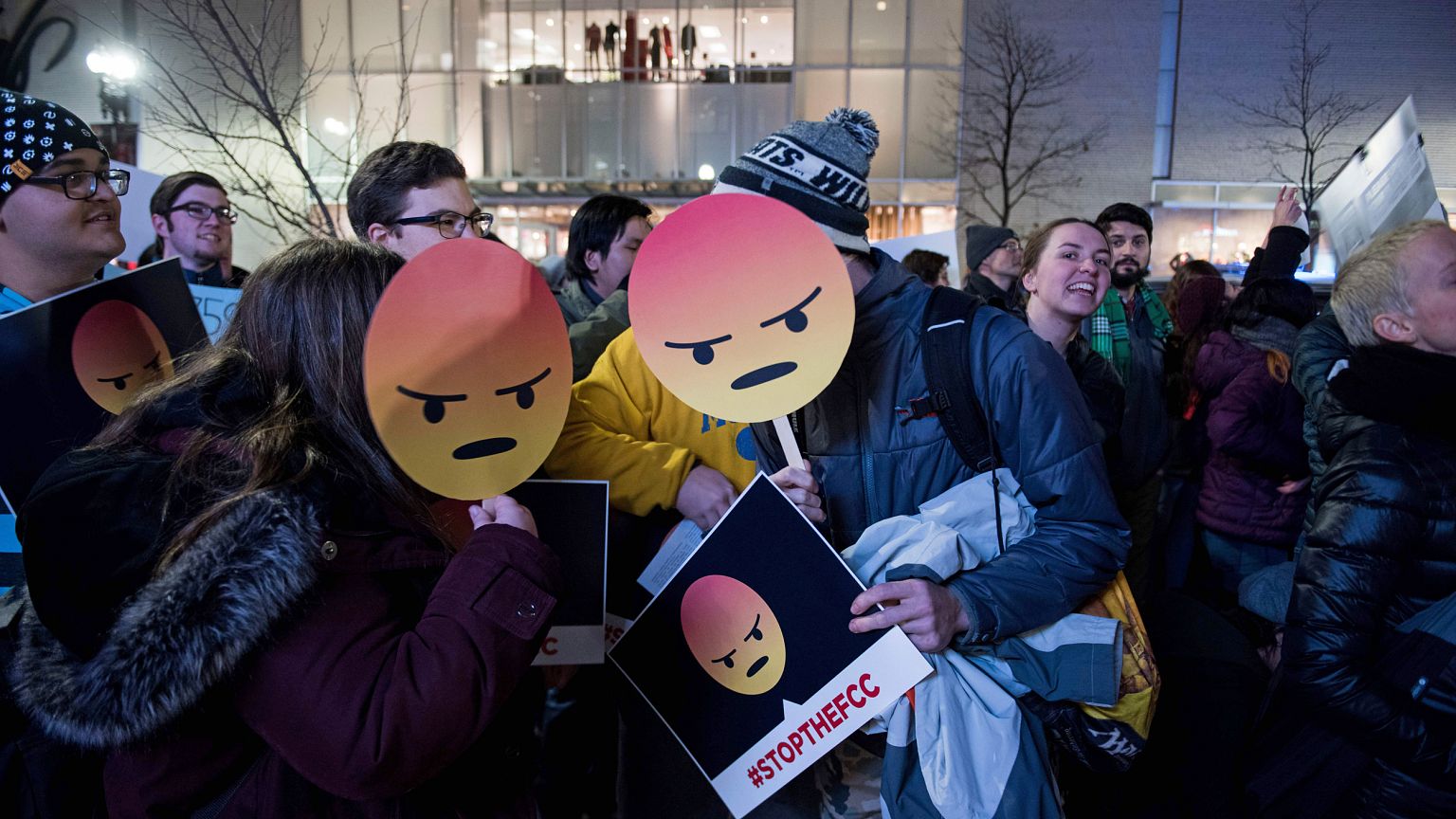 Image: Protesters gather on Bolyston Street in front of a Verizon store dur