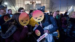 Image: Protesters gather on Bolyston Street in front of a Verizon store dur
