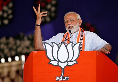 India\'s Prime Minister Narendra Modi addresses a campaign rally in Junagadh, India, on Wednesday.