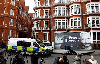 A truck carrying a poster featuring WikiLeaks founder Julian Assange outside the Ecuadorian Embassy in London on Friday.