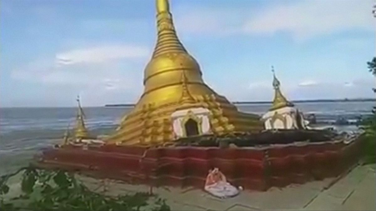 Buddhist pagoda falls into river in Myanmar
