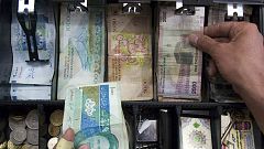 واحد پول ایران تومان می‌شود