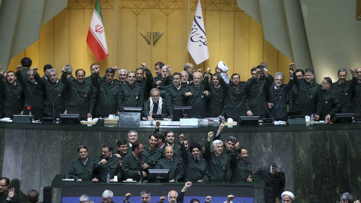 Image: Wearing the uniform of the Iranian Revolutionary Guard, lawmakers ch