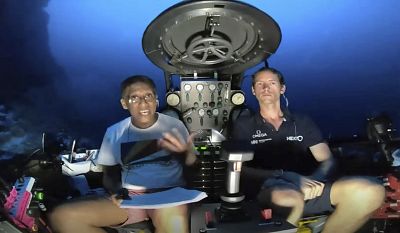 Seychelles President Danny Faure, left, speaks from insider a submersible of the vessel Ocean Zephyr underwater off the coast of Desroches on April 14, 2019.