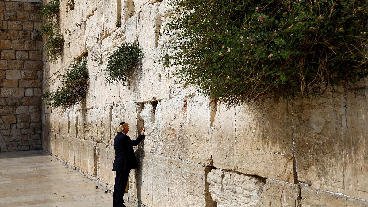 Image: Trump touches the Western Wall, Judaism's holiest prayer site, in Je